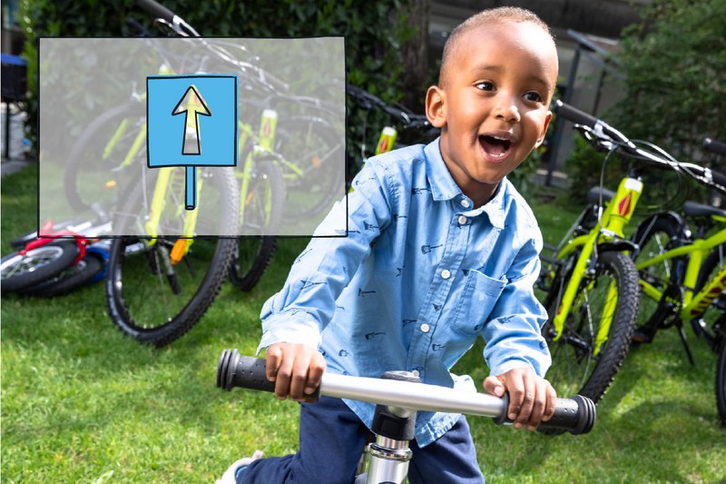 Das Bild zeigt ein Kind auf einem Velo, es nutzt somit das Angebot des Kinderveloverleihs im Tscharnergut. Links oben im Bild ist das Icon des Handlungsfelds 4 - Mobilität - dargestellt.